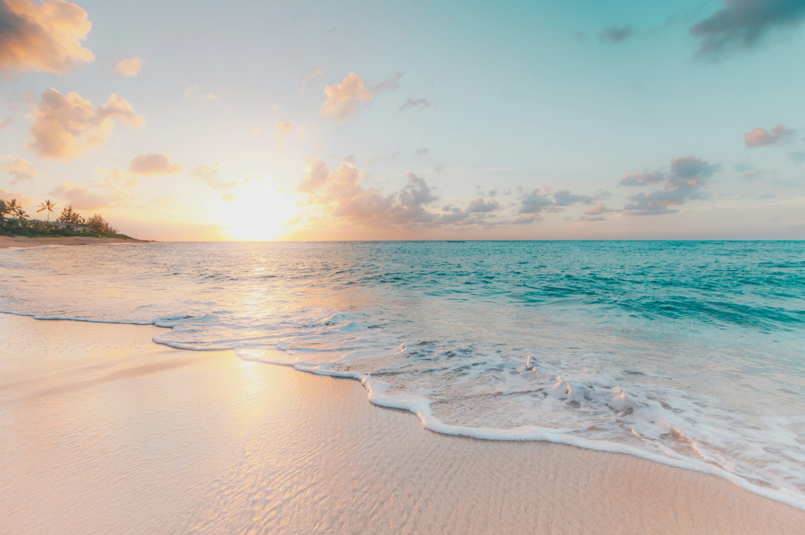 Turquoise shoreline at sunrise